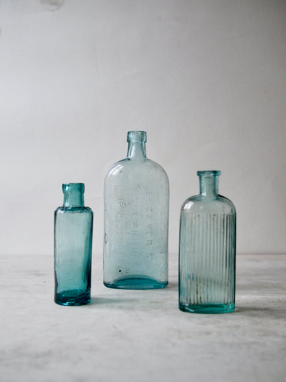 Trio of Aqua Glass Bottles